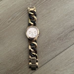 Michael Kors chain-link watch.